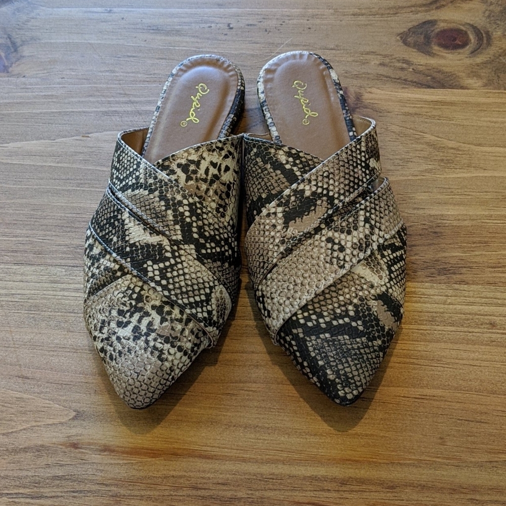 Women's slip on snake print shoes
